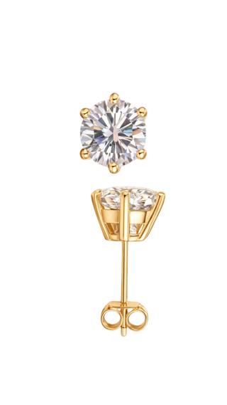Gold stud earrings with clear gemstones on a white background