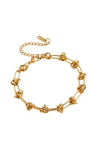 Gold chain bracelet on a white background