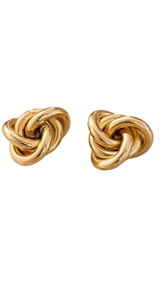 Pair of gold knot earrings on a white background
