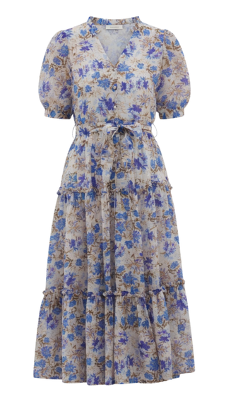 Floral dress with blue and purple flowers on a white frame, on a white background