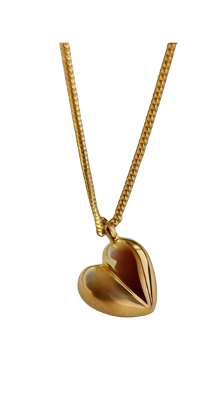 Gold heart-shaped pendant on a chain against a white background